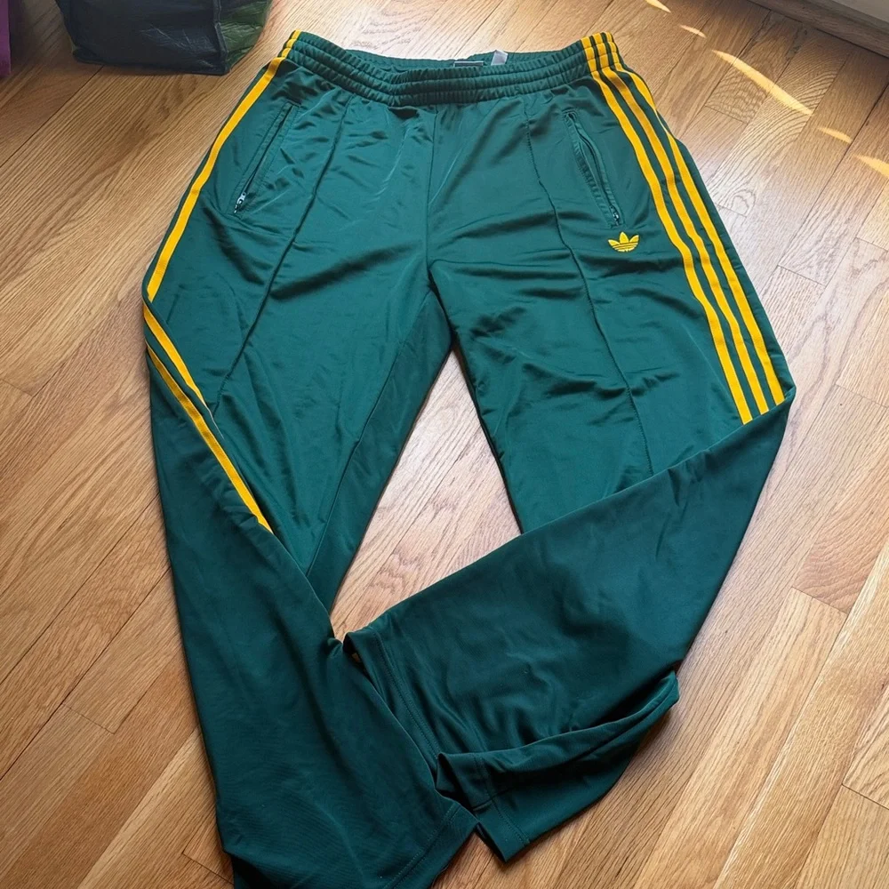 adidas Green Track Pants with Yellow Side Stripes - Picture 1 of 8